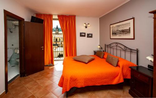 Postel nebo postele na pokoji v ubytování Hotel Neapolis
