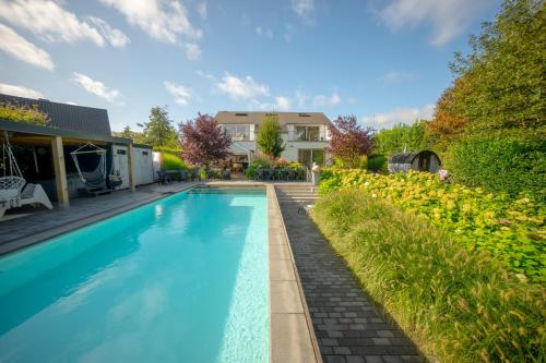 Gallery image of Vakantievilla met zwembad, wellness en glamping in Paal/Beringen in Beringen