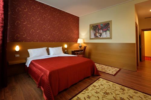 Postel nebo postele na pokoji v ubytování Hotel Austria