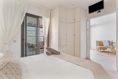 Ένα ή περισσότερα κρεβάτια σε δωμάτιο στο Villa Toro 2