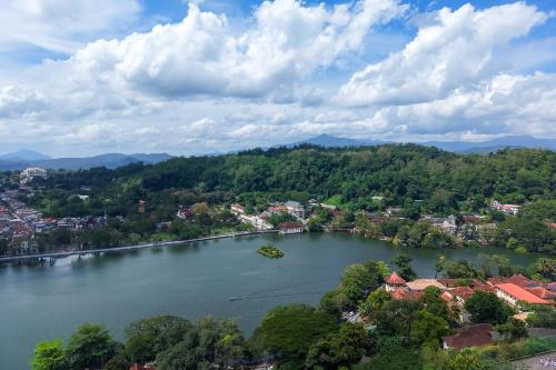 an aerial view of a river in a city at 360 Viewpoint by Queens Mount in Kandy