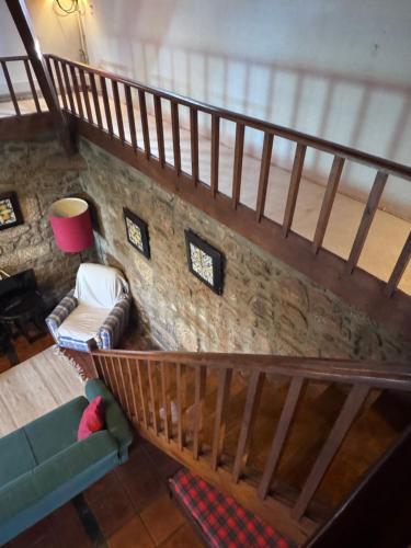 an overhead view of a living room with a staircase at Casa da Quinta De S. Martinho in Vila Real