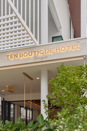 a sign that reads ten boutique hotel on a building at Ten Boutique Hotel Oldtown Chiangmai in Chiang Mai