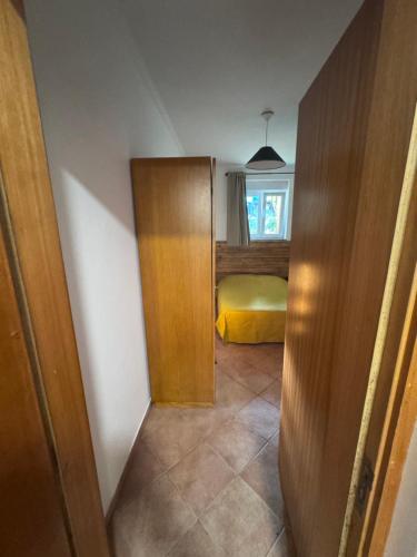 a small room with a bedroom with a bed at Casa da Quinta De S. Martinho in Vila Real