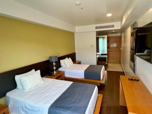 Concept Hotel - Centro Zamoraにあるベッド