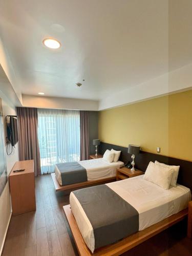 Concept Hotel - Centro Zamoraにあるベッド