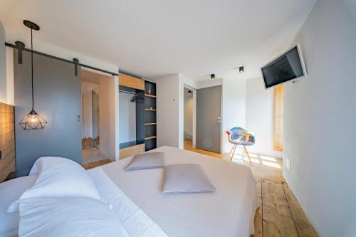 Postel nebo postele na pokoji v ubytování Casa Pasini-Foresteria