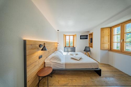 Postel nebo postele na pokoji v ubytování Casa Pasini-Foresteria