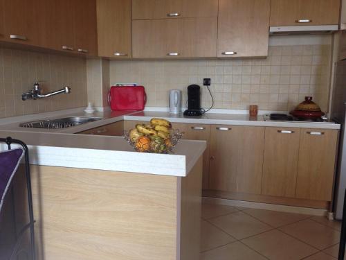 Η κουζίνα ή μικρή κουζίνα στο Appartement OCEAN VIEW