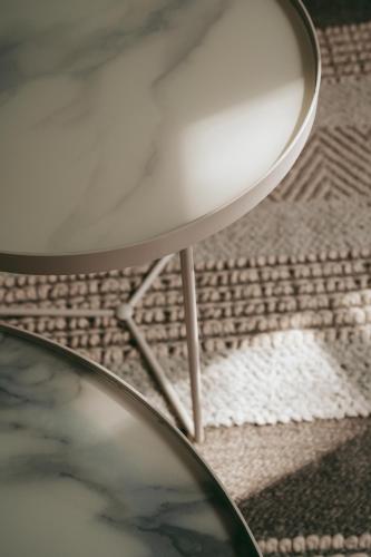 a white table with a mirror on the floor at Rondaia, a Winery & Fincahotel-Agroturismo in Tramuntana in Esporles