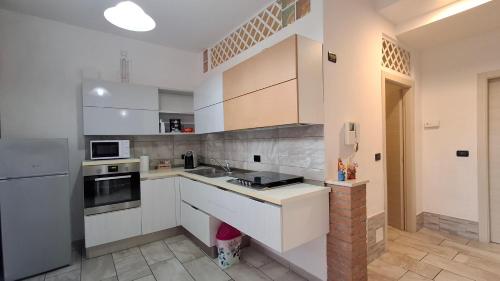 Kuchyň nebo kuchyňský kout v ubytování La Casa di Anastasya