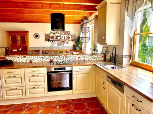 Dapur atau dapur kecil di Haus am Fluss