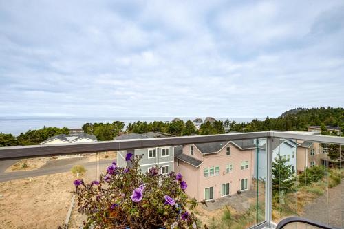 a view from the balcony of a house at Walk to Beach WFH-Friendly Retreat in Tillamook! in Tillamook
