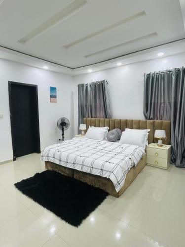 Una cama o camas en una habitación de Orchard Block 5
