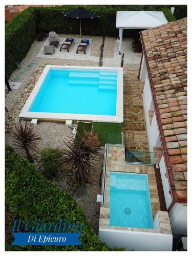 an overhead view of a swimming pool in a yard at Il Giardino Di Epicuro in Rocca San Giovanni