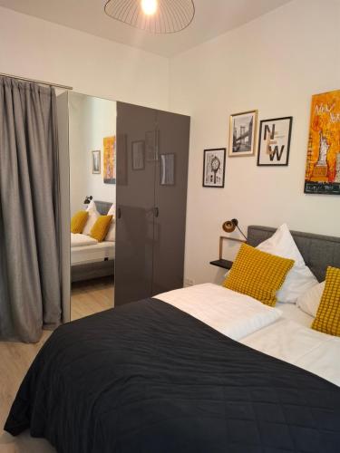 En eller flere senge i et værelse på Urban-Chic-Zentral-Bahnhof-Altstadt-Mediapaket-W2