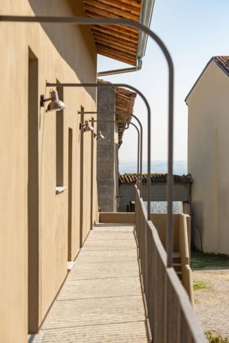 a wooden walkway leading up to a building at Torno subito in Ottiglio