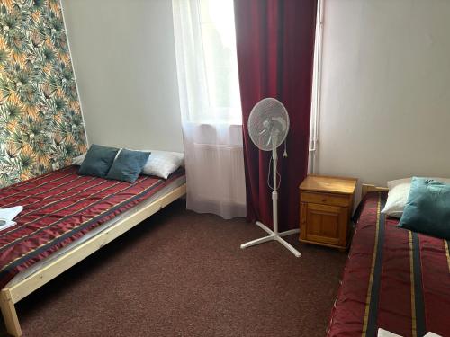 Postel nebo postele na pokoji v ubytování RETRO Noclegi