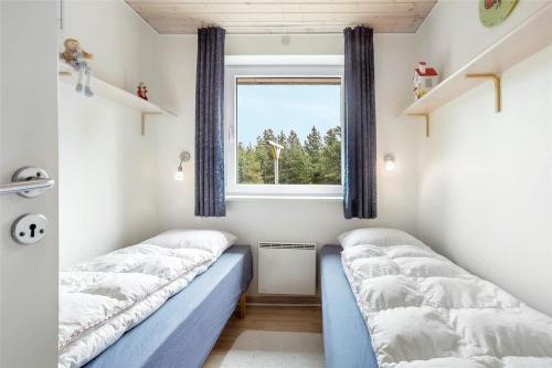 Postel nebo postele na pokoji v ubytování 0178-Romo-Julianehab-10