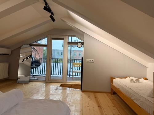 Ένα ή περισσότερα κρεβάτια σε δωμάτιο στο Dinamo House