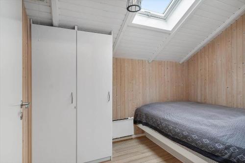 Giường trong phòng chung tại 0304-Romo-Vestergade-3-Ap-58