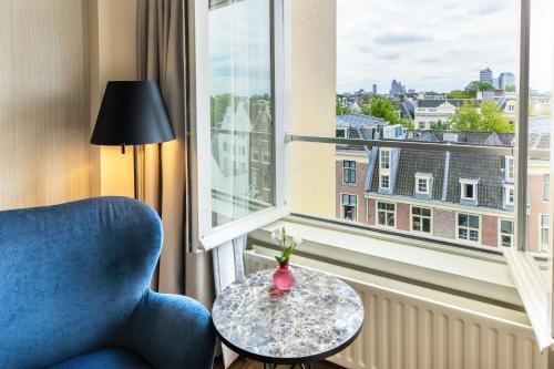 Zona de estar de NH Amsterdam Schiller