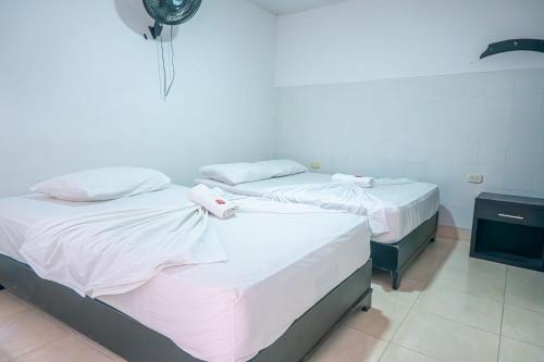 Cama o camas de una habitación en Hotel Casa Mendez