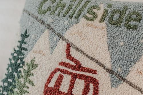 a close up of a tile with the words gilbertsteensteensteen art at Chillside Chalet Modern West Vail Townhouse! in Vail