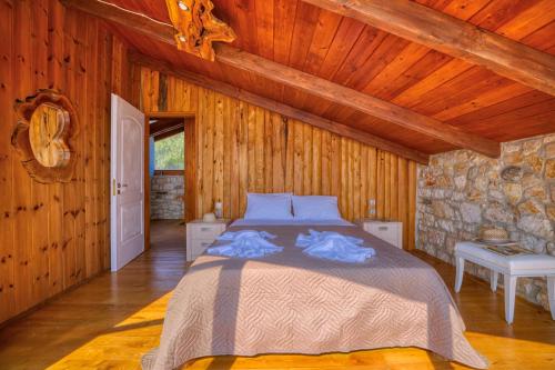 Ένα ή περισσότερα κρεβάτια σε δωμάτιο στο Villa Phoebus