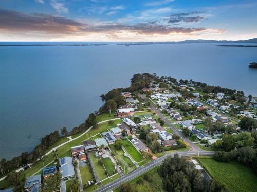 an aerial view of a town next to the water at Serenity by the Lake in Rocky Point