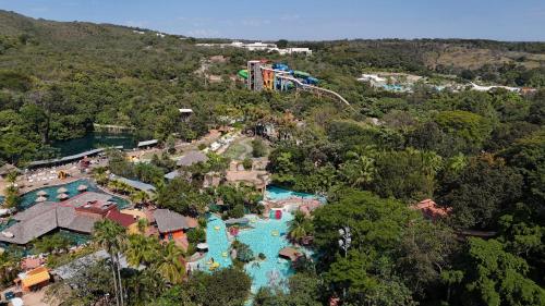an aerial view of a water park with a roller coaster at Rio Quente Resorts - Hotel Giardino in Rio Quente