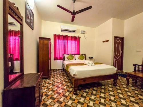 Una cama o camas en una habitación de Saverra Resort