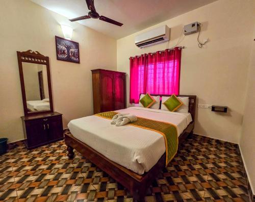 Una cama o camas en una habitación de Saverra Resort