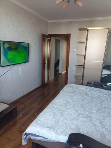 Llit o llits en una habitació de Spacious Buiucani Apartment