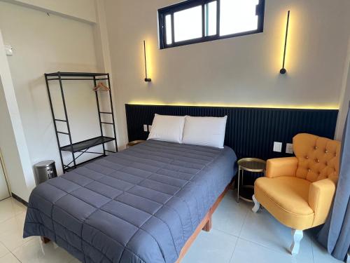 Postel nebo postele na pokoji v ubytování HOTEL BOUTIQUE ÁRBOL De LA VIDA