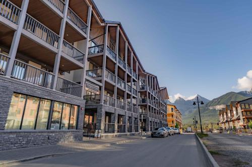 an empty street in a city with buildings at Timberstone Condo by Canadian Rockies Vacation Rentals in Canmore