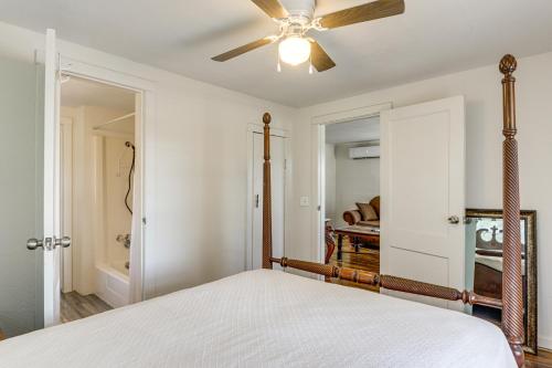 a bedroom with a bed with a ceiling fan at Lake Days, BBQs and Fireside Nights Afton Retreat in Afton