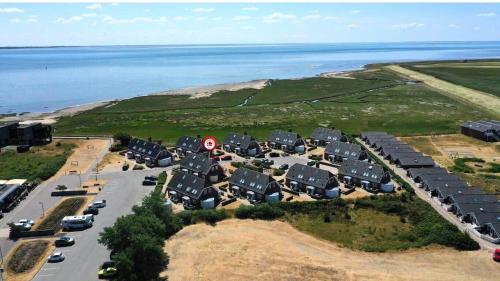an aerial view of a group of houses by the water at 0476-Romo-Sonder-Frankel-6 in Havneby