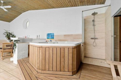a bathroom with a sink and a shower at 8017-Knebel-Manhojvej-1 in Knebel