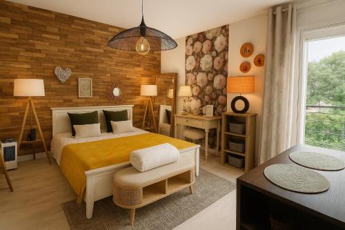 a bedroom with a large bed and a window at Petit cocon proche de Stanislas in Nancy