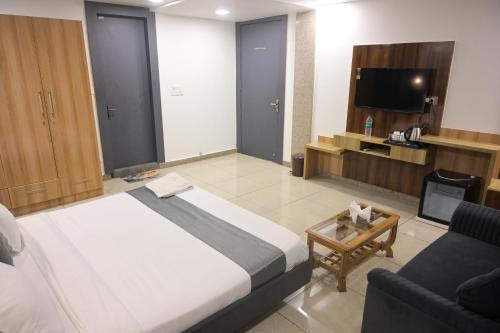 TV/Unterhaltungsangebot in der Unterkunft Raj Residency Gurgaon