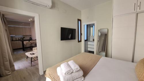 TV/trung tâm giải trí tại Suspiro Penthouse 302 by Florentia Homes