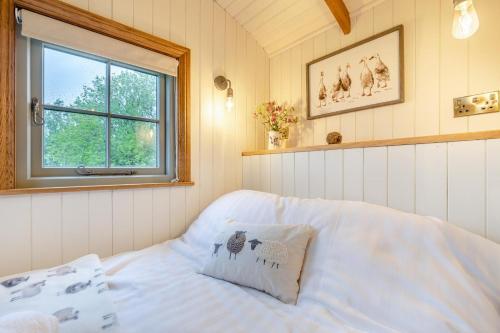 Voodi või voodid majutusasutuse Hillside Hideout toas