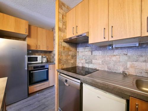 Appartement charmant, ski au pied, 4 à 6 pers, balcon sud, Wi-Fi, casier à skis, proche commerces - FR-1-452-272
