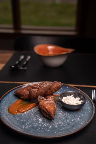 ゲストハウスの敷地内または近くでの食事または食べ物
