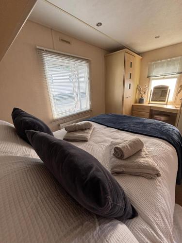 Ένα ή περισσότερα κρεβάτια σε δωμάτιο στο Welsh Bayview Retreat