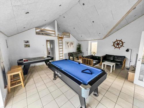 a large living room with a pool table in it at 2002-Romo-Juvrevej-51b in Toftum
