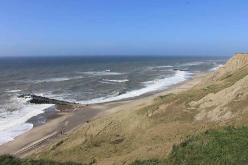 an aerial view of a beach with the ocean at 530-Lemvig-Lokkevej-59-D in Lemvig