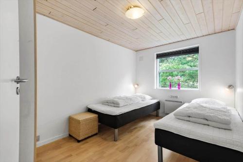 Ένα ή περισσότερα κρεβάτια σε δωμάτιο στο 2801-Romo-Helmusager-4