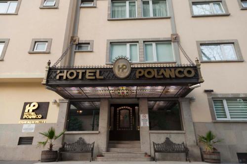 a building with a sign for aotel polonia at Hotel Polanco in Mexico City